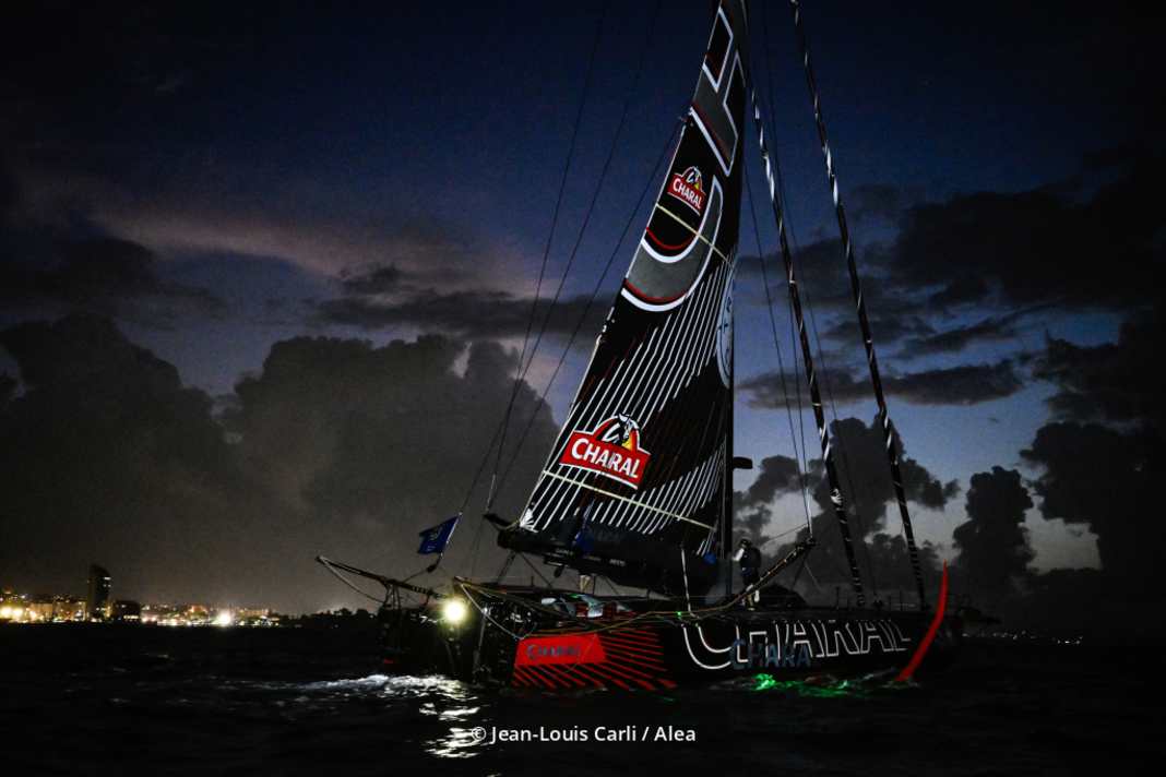 Shortly after 5 a.m. local time, the "Charal" team crosses the finish line off Martinique.