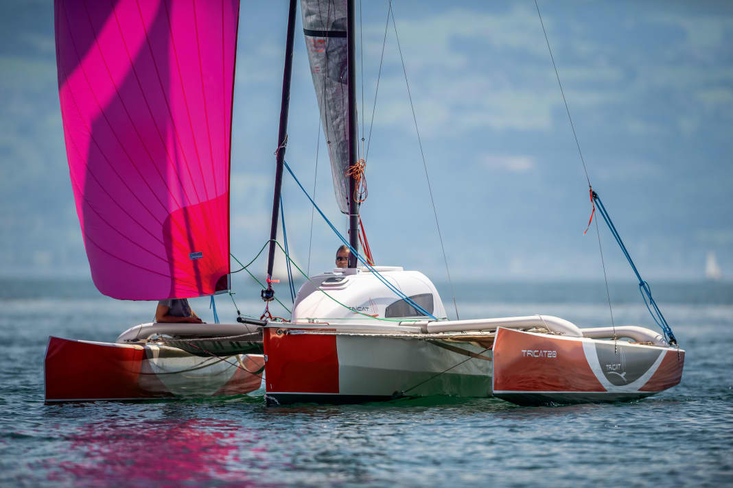 Contrasting. The high cabin superstructure does not match the sporty hulls visually, but provides plenty of space below deck