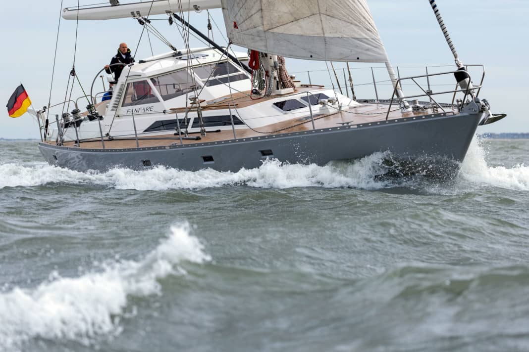 The freeboard is moderate for the size of the boat. The old sails have now been replaced