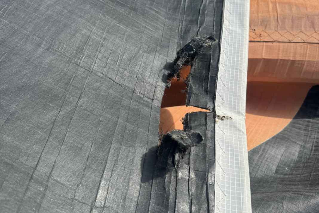 Tired sails on board Manuel Cousins' "Coup de Pouce".