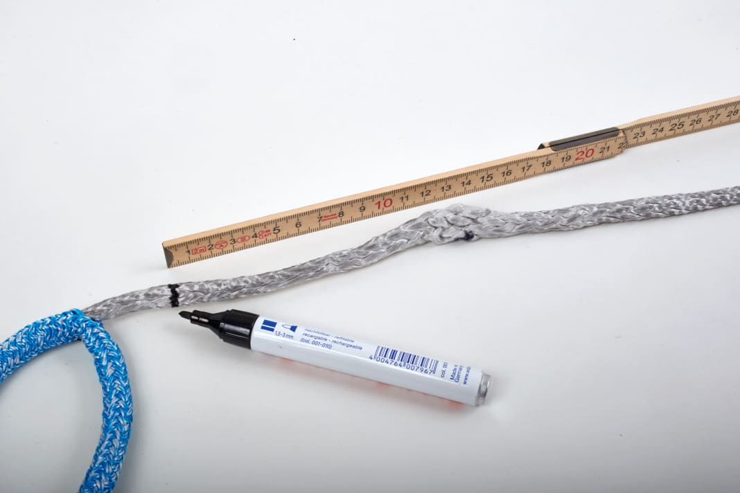 Den Kern an der 47-Zentimeter-Marke aus dem kurzen Ende herausziehen, und zwar so weit, dass vom Ende aus die volle Spleißlänge von 60 Zentimetern markiert werden kann