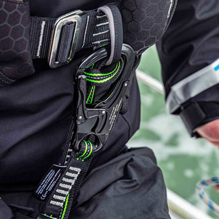 A lifebelt is integrated, the safety line is hooked into a lightweight belt loop