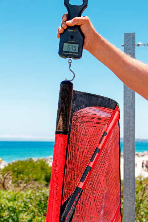   No, the sail is not at the bottom - 6.3 kilos is the lightest 5.3 rig on the market.