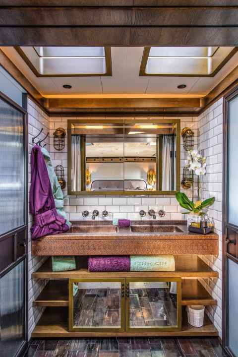 ... the owner's bathroom in the bow Metro-style tiles made of lightweight composite