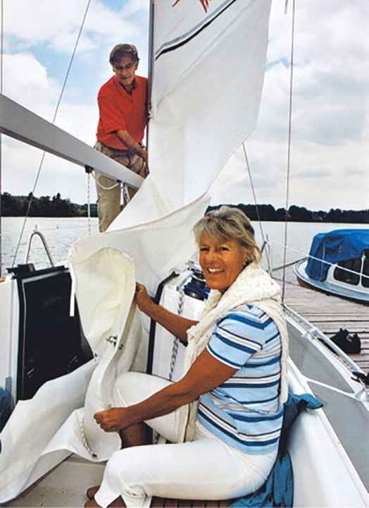   With his wife and sailing partner Karin on his dinghy on the Staffelsee