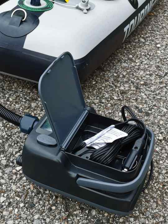 Charging cables for the socket and cigarette lighter are elegantly stored in a - small - compartment