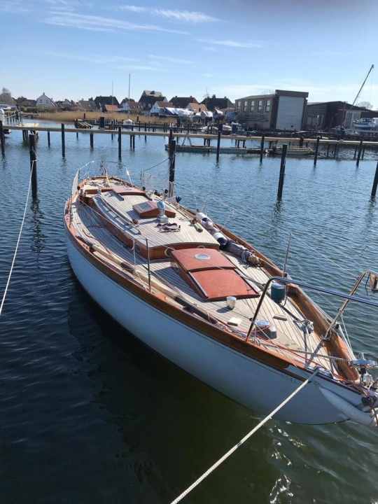   "Hera" fresh from winter storage and in front of her equipment for the three-month summer cruise
