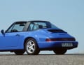 1989 stellt Porsche die Karosserievariante Targa des ersten allradgetriebenen 911 (interne Bezeichnung 964 und damit die dritte Generation der Sportwagen-Ikone aus Zuffenhausen vor.