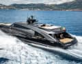 Batman lines: The aft bow integrates the lounge and exhaust outlets.  The yacht name is emblazoned at the stern next to the owner's name