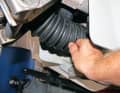 The best way to check the folding bellows for damage is with the drive set to high speed