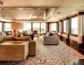 Main deck: The carpet of the large saloon picks up on the beach club interior theme with its water-sand look