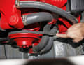 The V-belt must be checked for damage and age-related cracks. For engines without an automatic tensioning mechanism: the belt is correctly tensioned if it can be pressed down by 1 cm or rotated by 90° using two fingers.