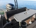 Aft there is an adjustable table with several seats