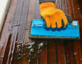 Step 5 - Sanding: Cleaning pads are used to treat the entire surface of the deck. Unlike scrubbing brushes, they do not penetrate deeply