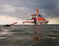 The "Neuharlingersiel" in front of the fairway buoy to which three girls had clung | DGzRS - ypscollection.de