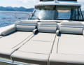 Sunbathing on the foredeck is a pleasure.  An escape hatch is installed under the centre cushion