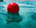 The position of the anchor is marked by a small inflatable ball above the anchor