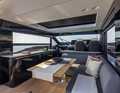 Christian Grande created a dark and cosy design above deck and light and airy below deck with light oak