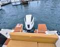 There are two small bathing platforms next to the outboard motor. The bathing ladder is also on the starboard side