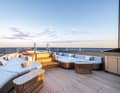 Socialising zones: For a relaxed get-together, guests meet at the front on the sun deck, ...