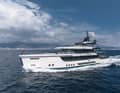 The striking bow conceals a hull designed by Van Oossanen. The bridge roof projects far forward and the glass bulwark is tinted.