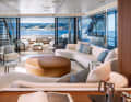 Transition: The large saloon is located in a glass box and opens seamlessly to the cockpit with its free-standing sofas and armchairs.