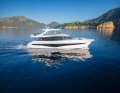 The similarly long and 32-knot flybridge model Y80