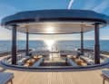 Pavilion: The hardtop lifts up hydraulically to reveal the jacuzzi, folding screen and ...
