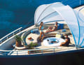 A bow lounge with a fireplace is integrated into the deck.