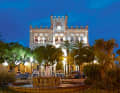 The illuminated town hall of Ciutadella on the "Plaça des Born", the main square of the "little town" on the west coast of Menorca