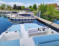 Spacious outdoor area: sun loungers at the bow and an outside steering position on the flybridge.