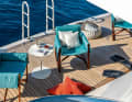 Comfort in the beach club: "Salina" chair by Paola Lenti with double fabric upholstery and internal padding.