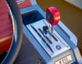 Unusual: the throttle lever is separate from the gear lever: a detail that originates from offshore racing.