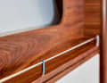 The finish of wood and metal is harmonious and of the highest standard.