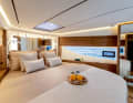 The owner's cabin in the foredeck offers a good view of the water. Hinged windows are set into the windscreens.