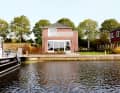 Holiday home on the water, jetty on the doorstep and the boat always ready to go.