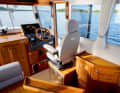 The helm station on our test boat features a large chart plotter and a suspension driver’s seat.