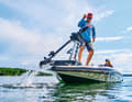 A handle:
After use, the bow engine is brought on board. With the outboard motor
at the stern.