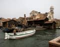 Exotic in the lagoon: The Hatecke shipyard's mini boat against the backdrop of Venice.