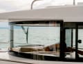 The windscreen is curved. This provides a good panoramic view and also looks good from the inside.