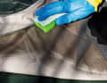 Step 2: Soak in warm water. As you can clearly see, the water-repellent treatment no longer works; the cloth becomes completely saturated.