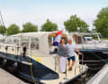 Karin Heijboer und Bart Mornout auf ihrer neu erworbenen Motoryacht.