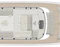 Main deck: The living 
and dining areas flow seamlessly into a bar and then onto the bridge. Sliding doors open this space onto the cockpit.
