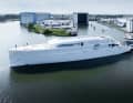 Profile: The first pictures show a slender hull with an almost vertical bow.