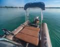 The sun lounger in the stern area, which also provides access to the swim ladder