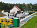Pleasure craft in the modern new Guzianka lock in the south-west of the lake district