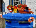 A heart for sea rescuers: decorated letterbox .