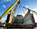 Rear section set down on the transport barge.