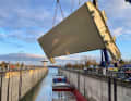 The new lock gate on the crane