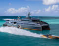 Off Antigua: "Rhaegal", a Skater 438, passes the 66-metre supply vessel "Hodor".